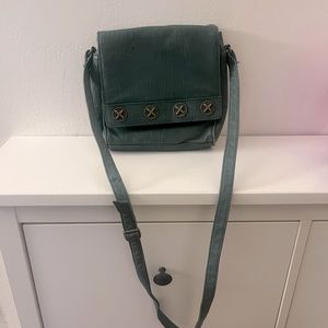 Wilson’s leather purse in dark green